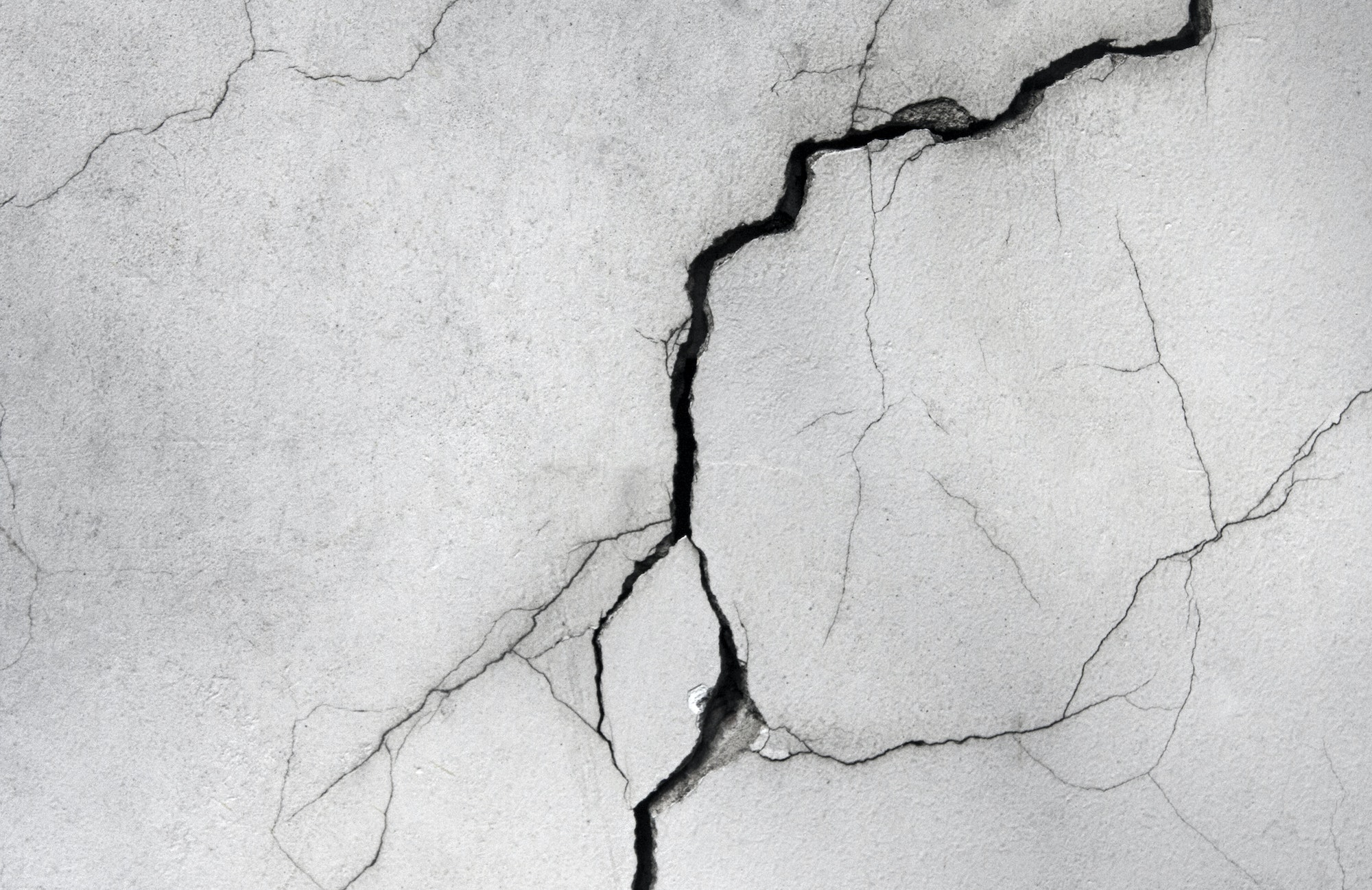 How To Repair Cracks And Holes In Concrete Surfaces